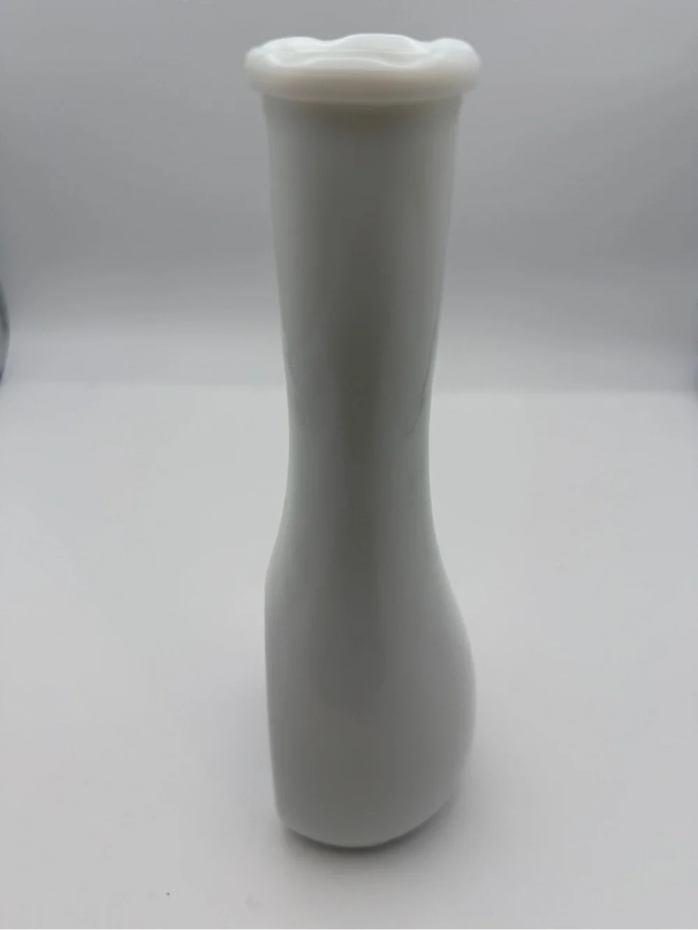 Vintage vase milk glass with embossed vines and scalloped rim